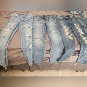 3 american eagle jeans and 2 Hollister jeans Size 0 total 5  jeans